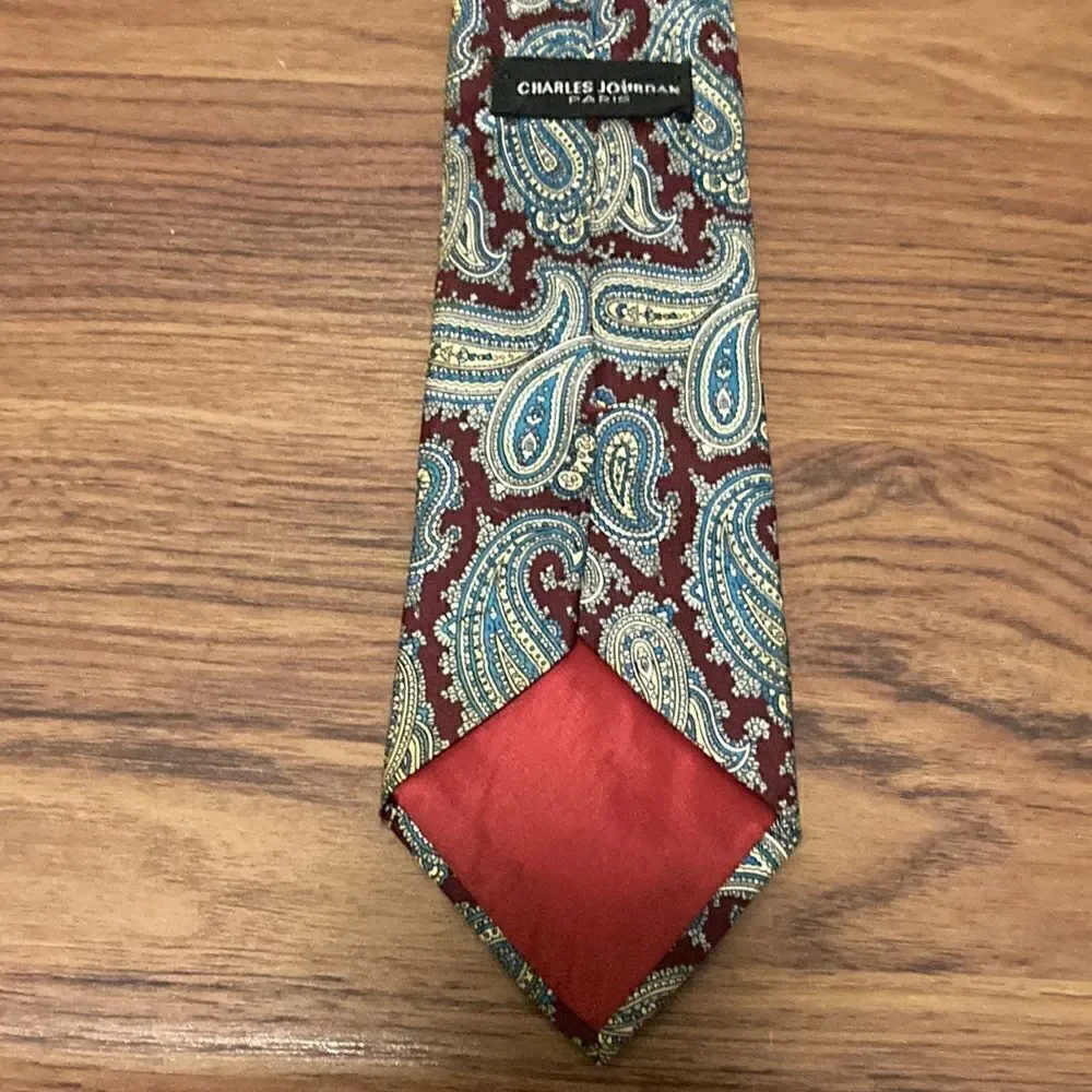 Charles Jordan Paris Silk Skinny Tie in Paisley Print with Burgundy Background.